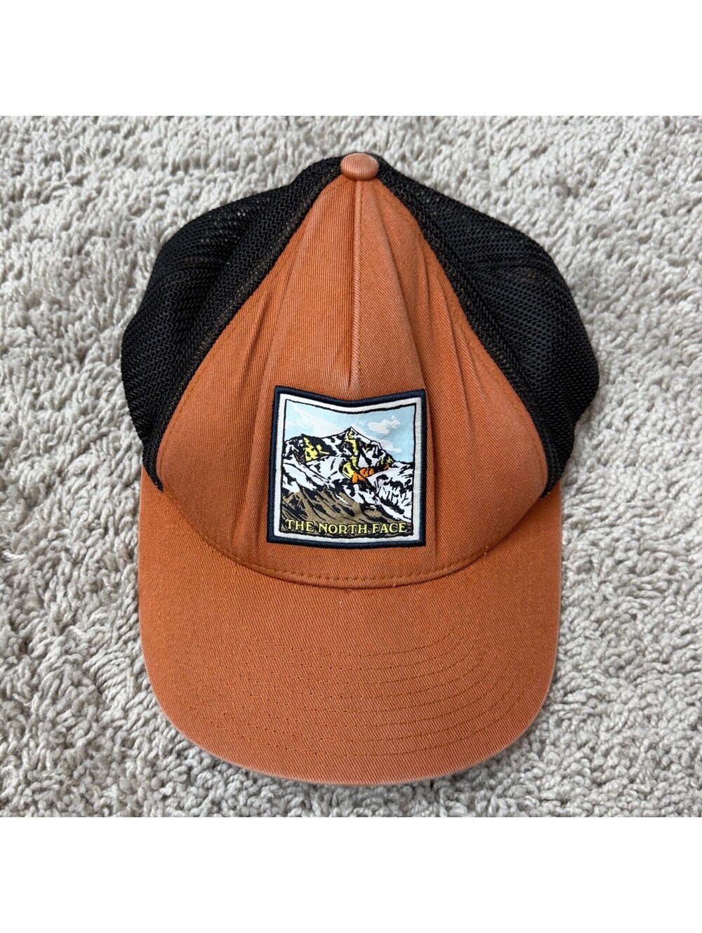 The North Face Orange and Black Mesh Trucker Cap Hat